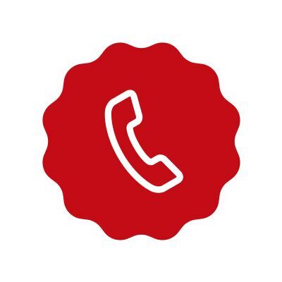 Czerwony telefon na białym tle w okrągłym znaczku.